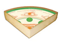 A triangular slice of Comté St. Antoine (Comté AOC Fort St. Antoine), with a label on top, is set against a white background