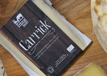 Ethical Dairy's Organic Carrick Cheese on a wooden table