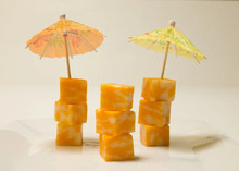 Colby Jack cheese cubes topped with mini cocktail umbrellas