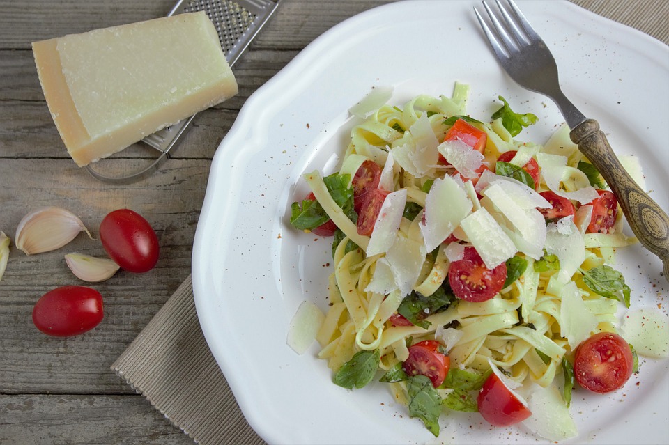 Parmesan cheese with noodles and pasta